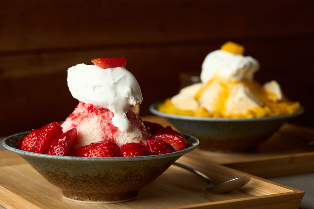 Overhead view of strawberry milk shaved ice dessert